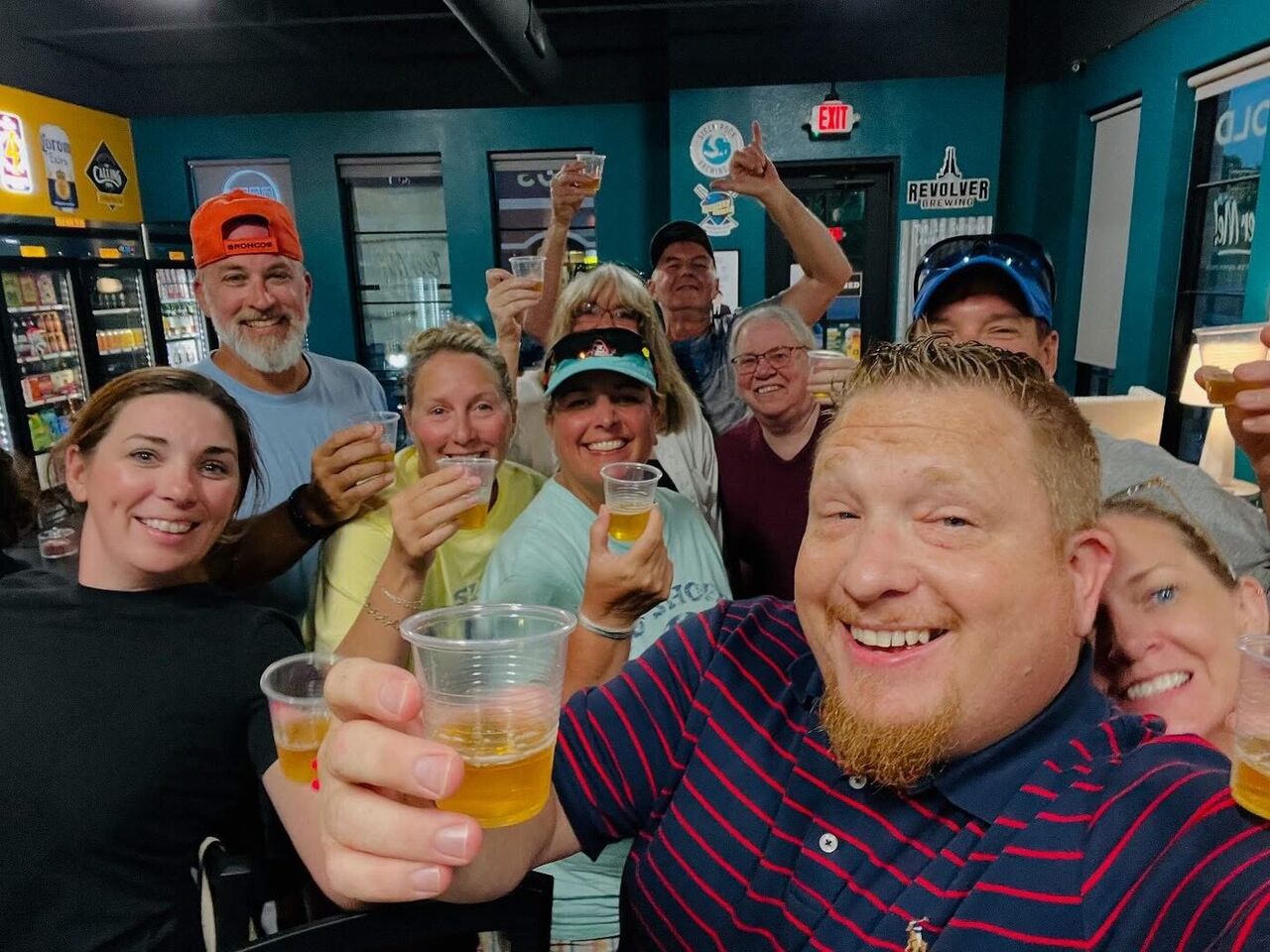 Beer Me! Taproom owner Eric Sinclair celebrating with regulars
