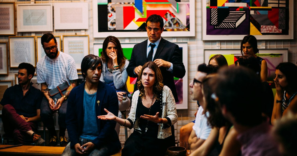 People talking at a local community networking meetup
